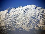 Mustang 02 05-2 Annapurna East, Annapurna Central, Annapurna Main, and Tilicho Peak From Pass After Samar Here is a close up view of Annapurna�s East, Central, and Main summits from the top of the pass (about 4000m) on the way to Rangbyung Cave in Upper Mustang. The snowy mountain on the right is Tilicho Peak (7134m), the highest point of the Grande Barrierre. Tilicho Peak was first climbed via the northwest shoulder on October 10, 1978 by Emmanuel Schmutz of France.